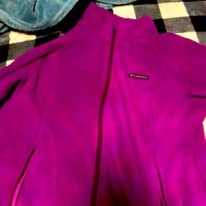This is a purple Columbia sweat shirt. It’s an Xl. It does not have a hood.